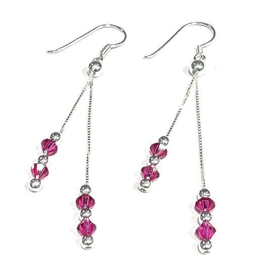 ARETES LARGOS FUCSIA - PLATA925